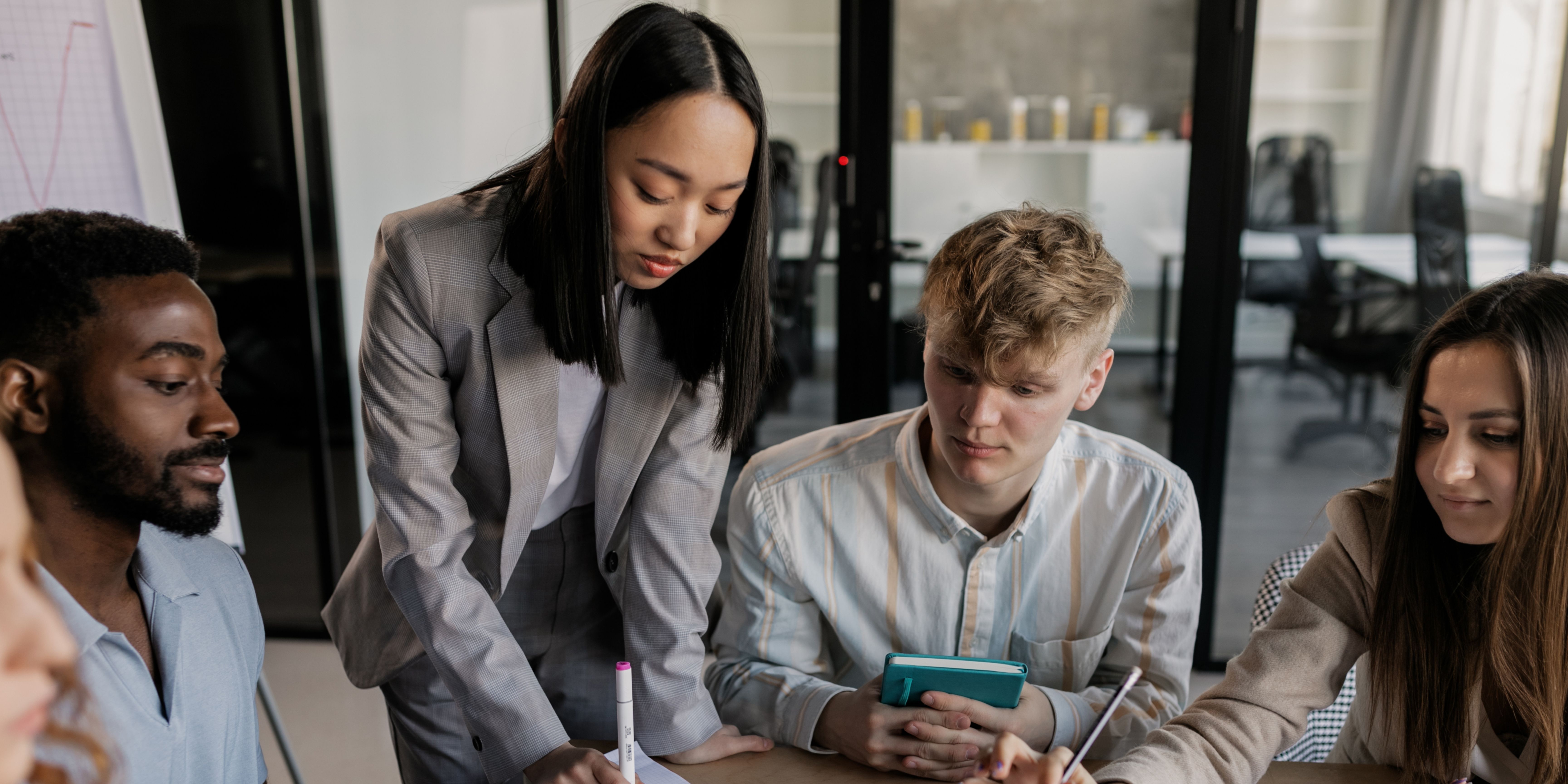 Students brainstorming ideas at a meeting