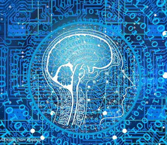 An image of a silhouetted human skull in white, on a blue background surrounded by zeroes and ones, and cogwheels