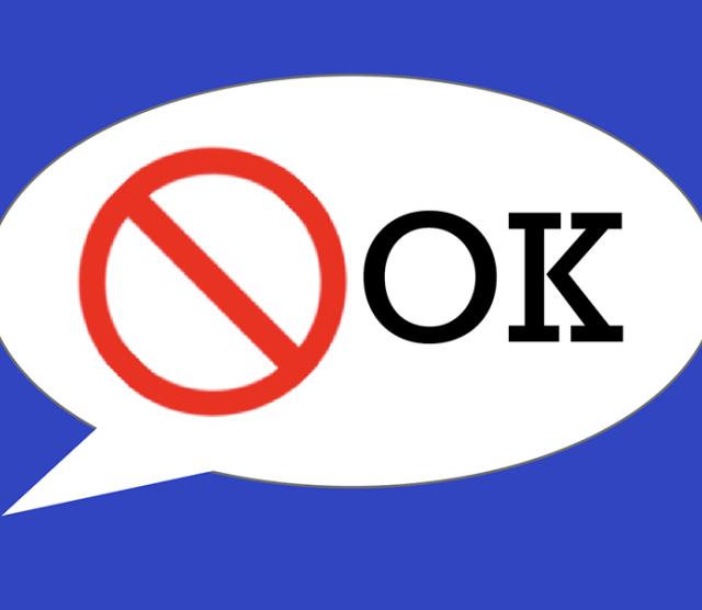 A screenshot of the notOK app, a white speechbubble against a blue background with a red crossed circle and the letters OK
